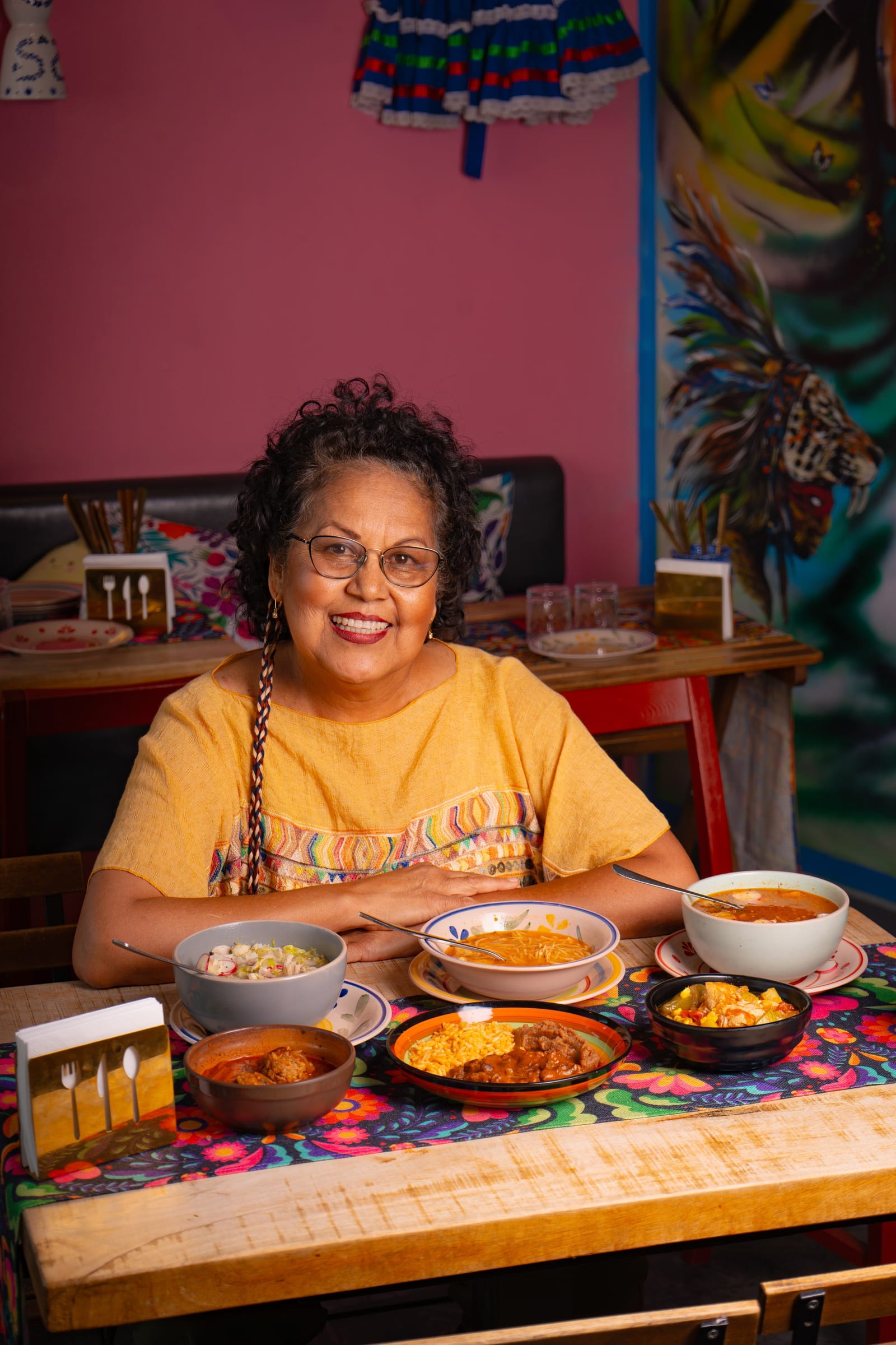 Querida Magazine — Mama's Best · Pozole rojo y blanco, page 5 of 10. Ten plates from Mama's kitchen — the new pozole, the family table, the room when it fills. Destination: Querida — Al Barsha 1, Dubai.