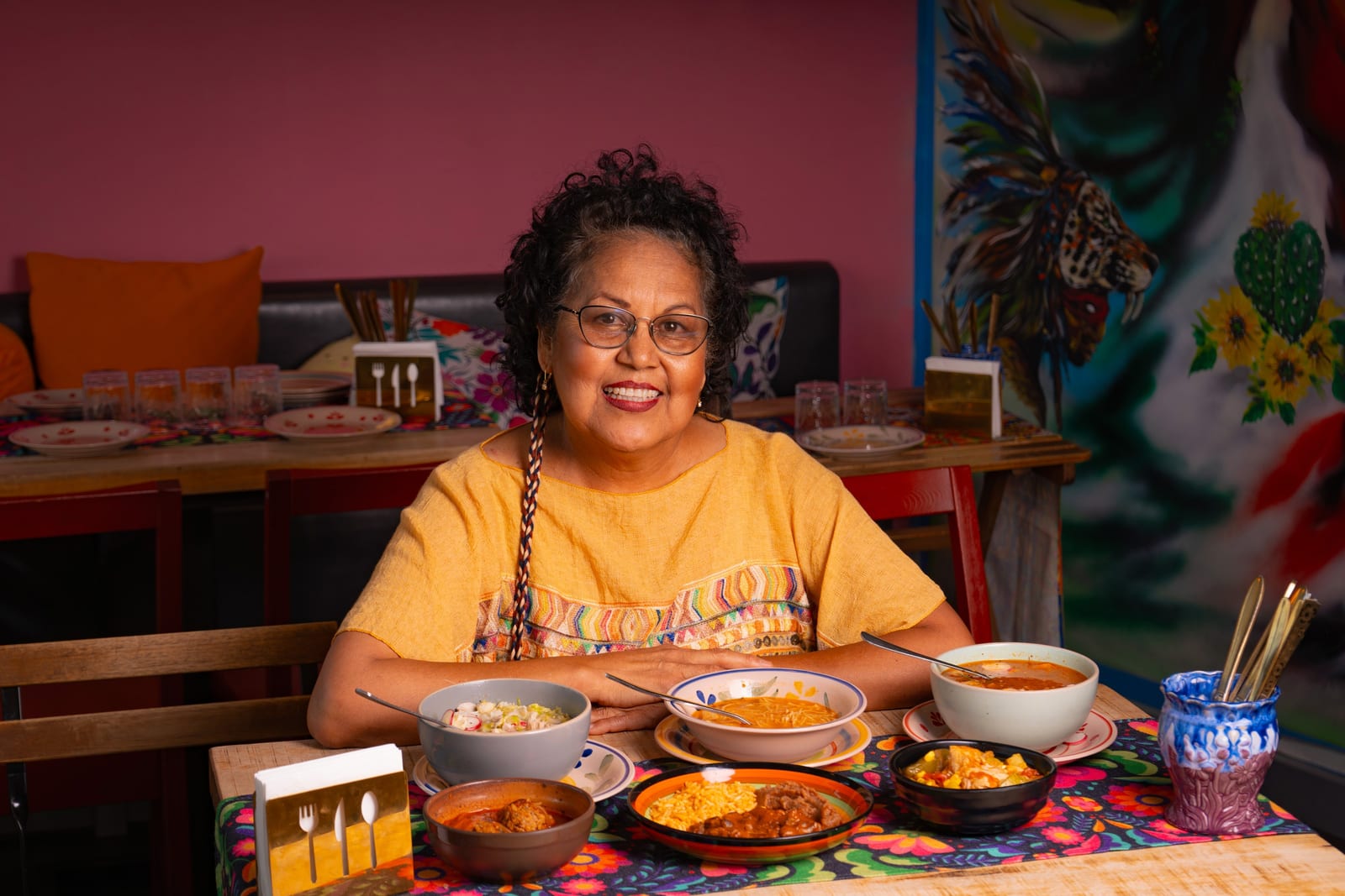 Querida Magazine — Mama's Best · Pozole rojo y blanco, page 6 of 10. Ten plates from Mama's kitchen — the new pozole, the family table, the room when it fills. Destination: Querida — Al Barsha 1, Dubai.