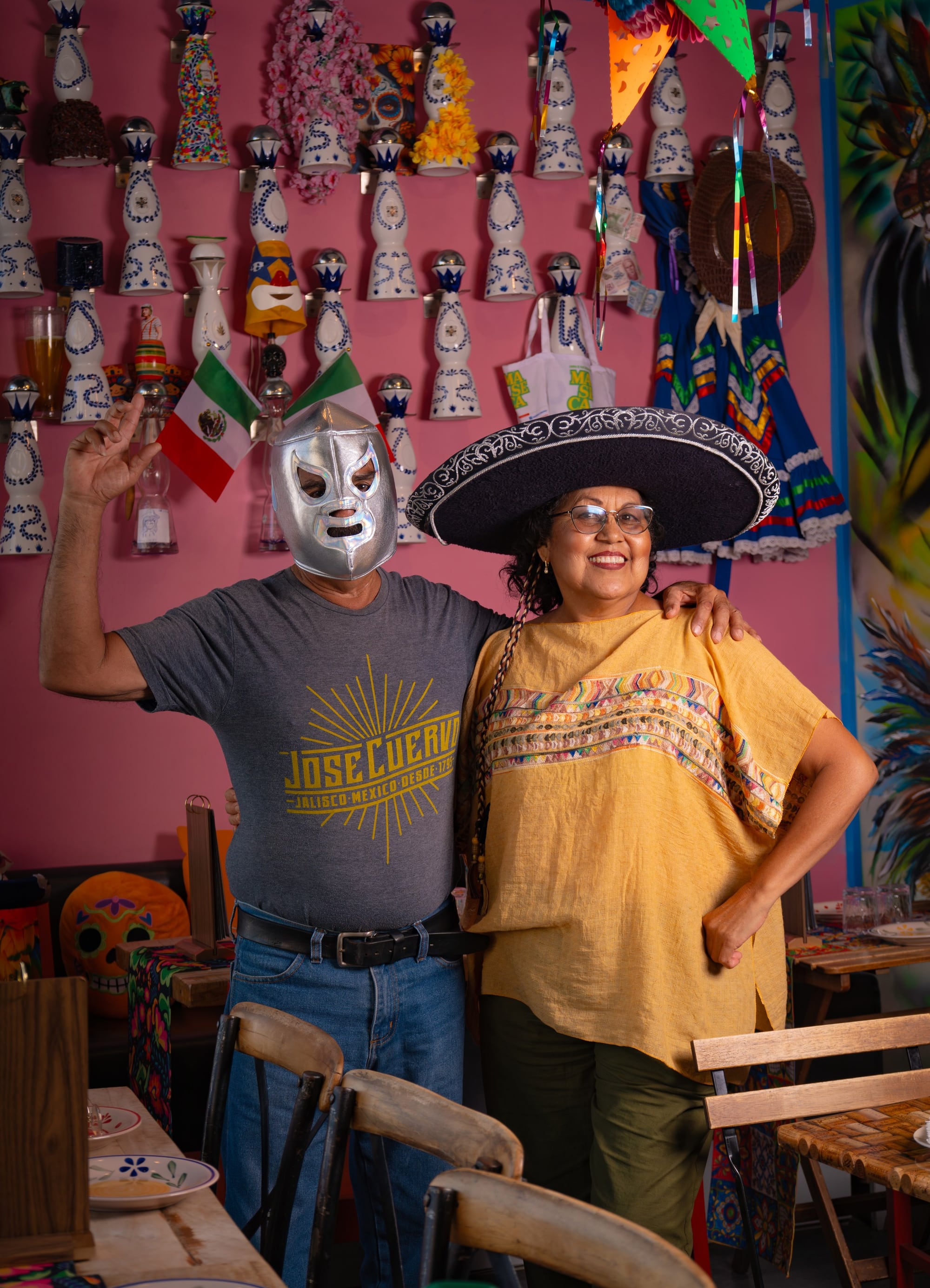 Mama Lalis in a charro sombrero with the luchador-masked Obed — Querida personalities